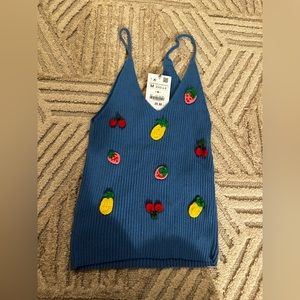 The cutest knit tank. Who’s ready for vacation?